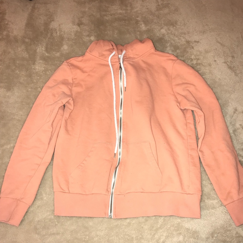 orange zip up